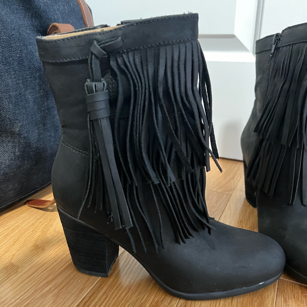 Black booties with fringe detail